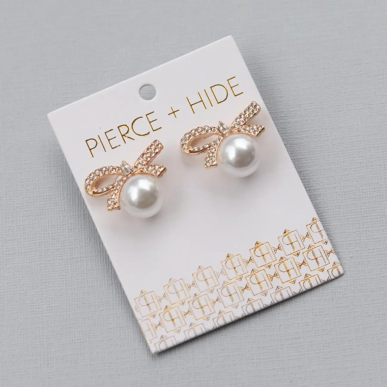 Pearl Bow Statement Stud