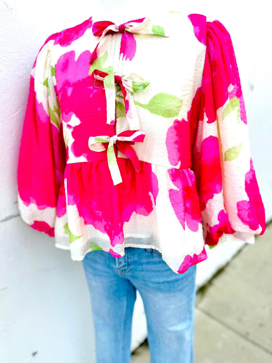 Take A Bow Peplum Top
